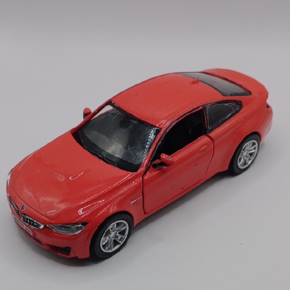 BMW Red Die-Cast Sports Car Toy with Sleek Design